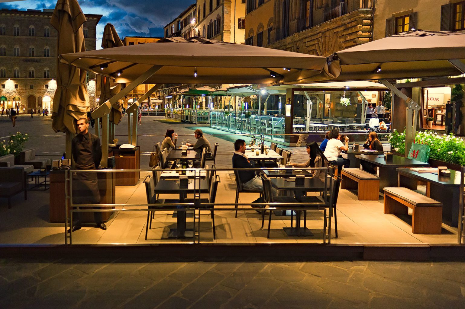 Evening dining outdoor umbrellas patio