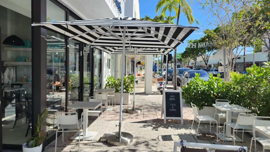 Discover the essence of Clasica Victoria with our Enzo Collection Center Post Umbrellas, offering both style and sun protection.